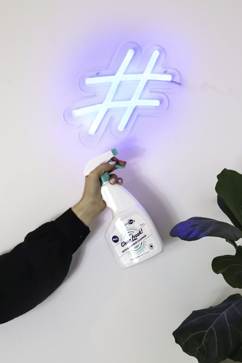 Cleaning solution with neon sign.